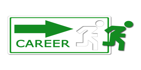 Image which shows an emergency escape sign with the green man leaving the sign